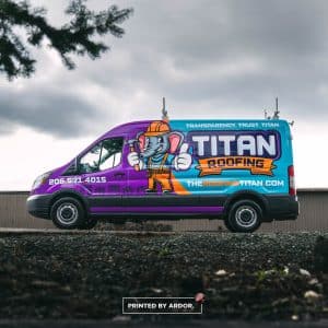 Side of a Ford Transit wrapped by Ardor Printing for Titan Roofing in Seattle, WA