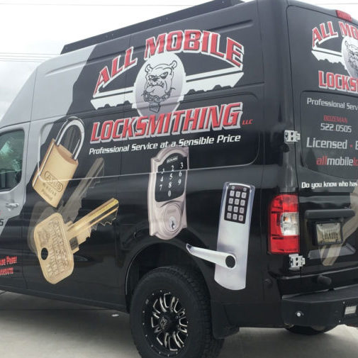 Locksmithing van with full black and red wrap.